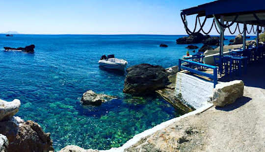 Sit and relax by the sea or swim at this tiny cove at Agia Fotia Taverna
