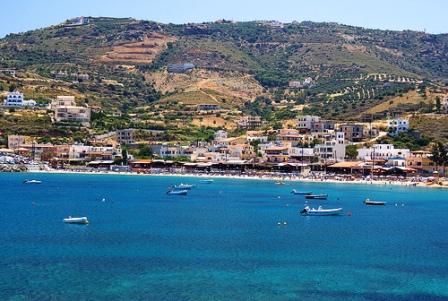 Looking across the bay to the apartments and olive groves...