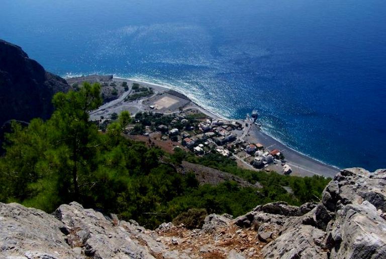 Walk through the gorge, crossing the mountains to the sea and arrive at Agia Roumeli on the south coast