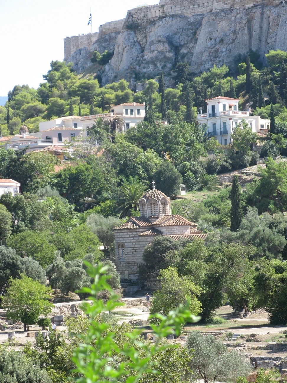 Walking around the ancient Agora which is a big wide open green space at the base of the Acropolis, just next to Plaka, is the way to start the day...