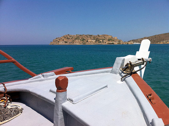 Take a boat to Spinalonga Island from Plaka or Elounda