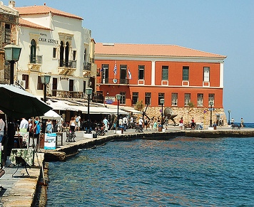 The limani is surrounded by interesting cafes, restaurants and museums, the ochre building is the Maritime Museum (image by Palazio)