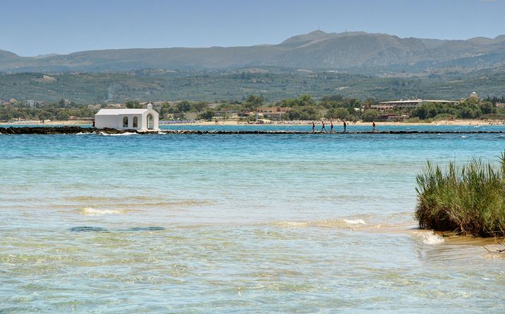 Georgioupolis Beach with the prettiest little chapel in Crete