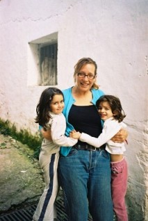 Katia with the girls in the village laneway...