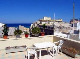 The budget Mirabello Hotel has a rooftop terrace with views to the Med, in central Heraklion, Crete