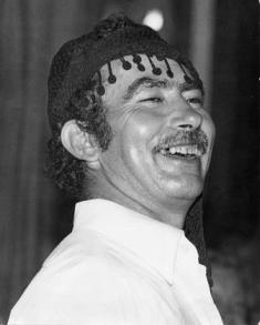 A Cretan man wears a 'sariki' headscarf