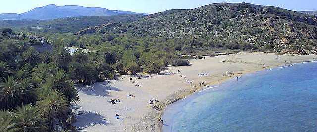 Vai Palm Forest and Beach is 25 km