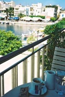 View from Cafe Du Lac over Lake Voulismeni with my coffee in the foreground! That is my kinda coffee spot :)