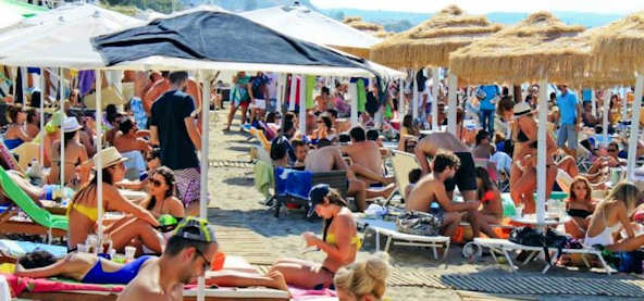 Busy summer buzz at the beach in Crete