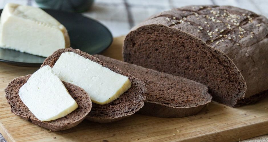 Carob Bread with salty cheese