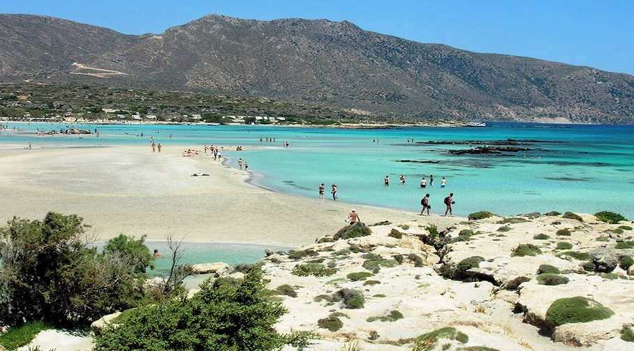 Islets dotted about the point and fine white sand