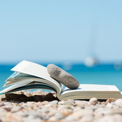 Book open on a beach