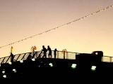 Silhouette of passengers on a ferry