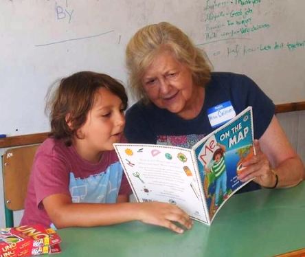 A volunteer teaching English in Greece