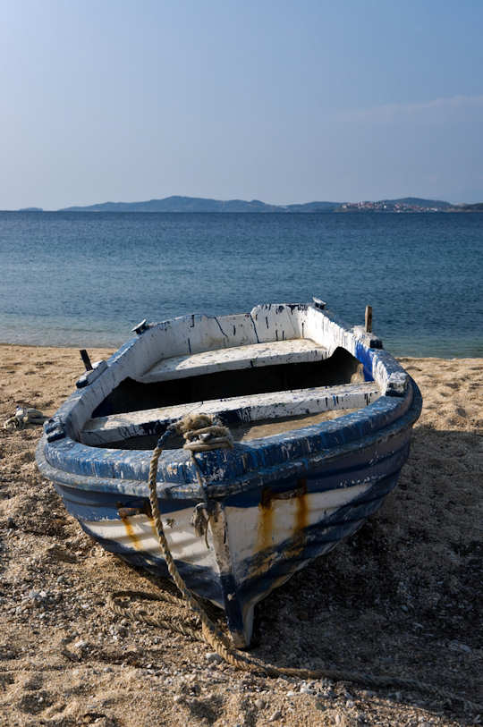 Old and Tired blue and white wooden boat, Ammouliani, Greece (image by Horia Varlan)