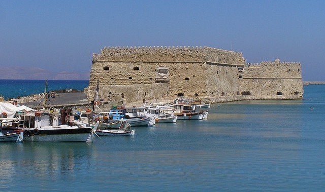 The old fort and fishing boats in the harbour