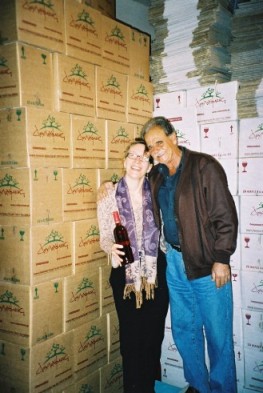 Katia with just a few bottles of the wine of Crete! and the kind friend who shared them!