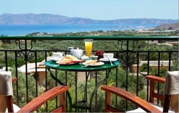 Kaliviani Traditional Guesthouse - view from balcony with breakfast over the bay