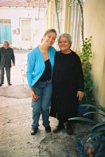 Katia with a friend in the village laneway...