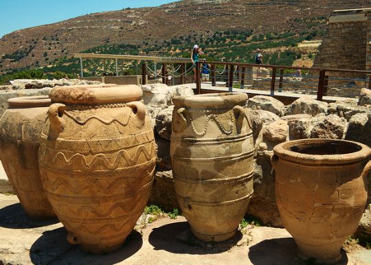 Knossos Palace site showing some large ancient storage jars 'pithoi' and the valley