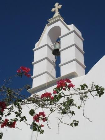 Mykonos Greece - I love this image - bright colours against the pristine white church, it seemed everywhere I looked in Mykonos there was symmetry such as this