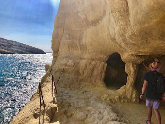 Exploring the caves at Matala Beach