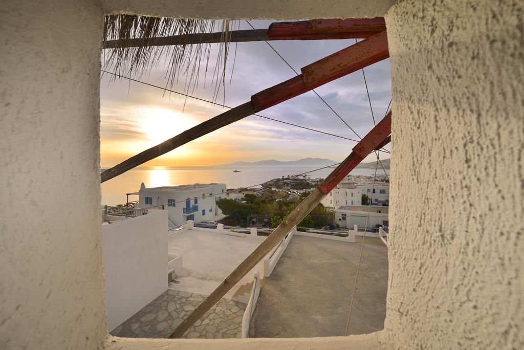 Stay inside one of the famous windmills in Mykonos (a great memory forever!)