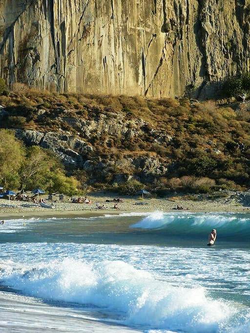Paligremnos Beach on Plakias Bay has stunning cliffs which are a favourite for rock climbers