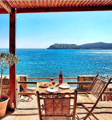 Cottages by the Sea at Plaka near Elounda have their own access to the sea and views across the bay to Spinalonga Island