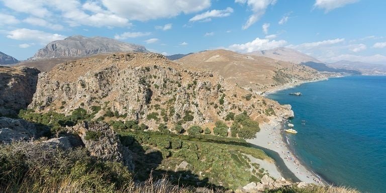 Preveli Crete - palm forest and beach at the southern end of Kourtaliotiko Gorge