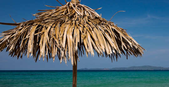 Life at the beach - straw of umbrella on a Greek summer day (image by Horia Varlan)