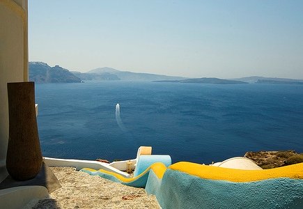 Santorini - steep sides of the caldera - coloured walkway and deep blue of the Med