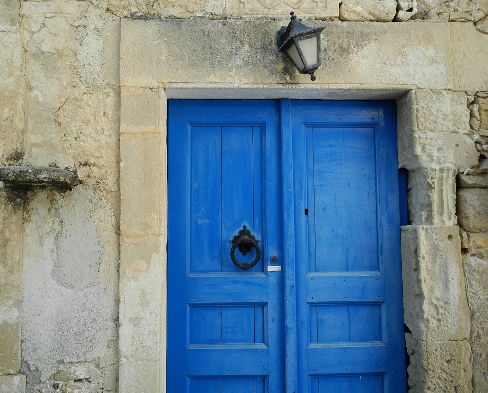 An old door with character in a small village in Crete