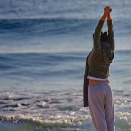Yoga stretch by the sea