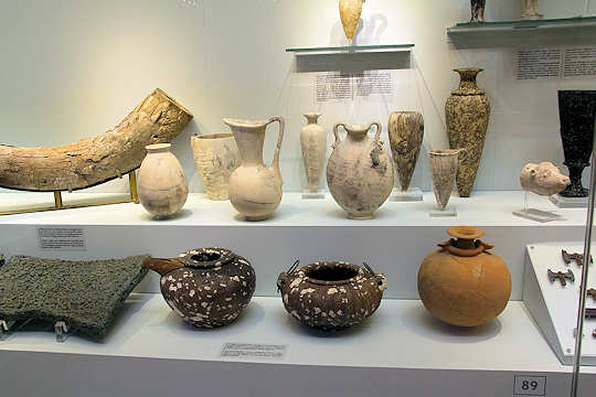 Elephant tusk from the Orient, copper ingots from Cyprus. Imported Egyptian vases modified by Minoans at Zakros, found in the Central Sanctuary Complex (Creative Commons Licensed image by Zde)
